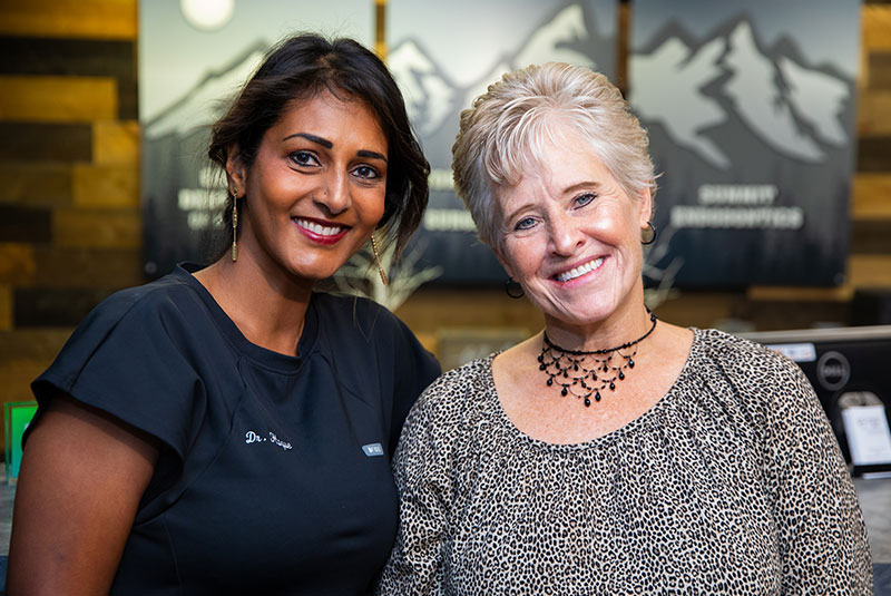 Doctor and patient smiling