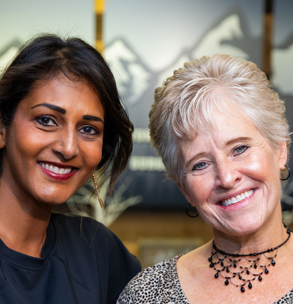 Patient and doctor smiling