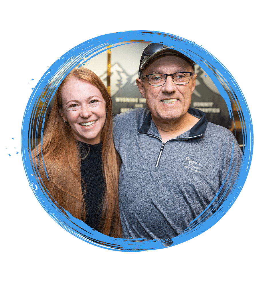 Patient and team member smiling together